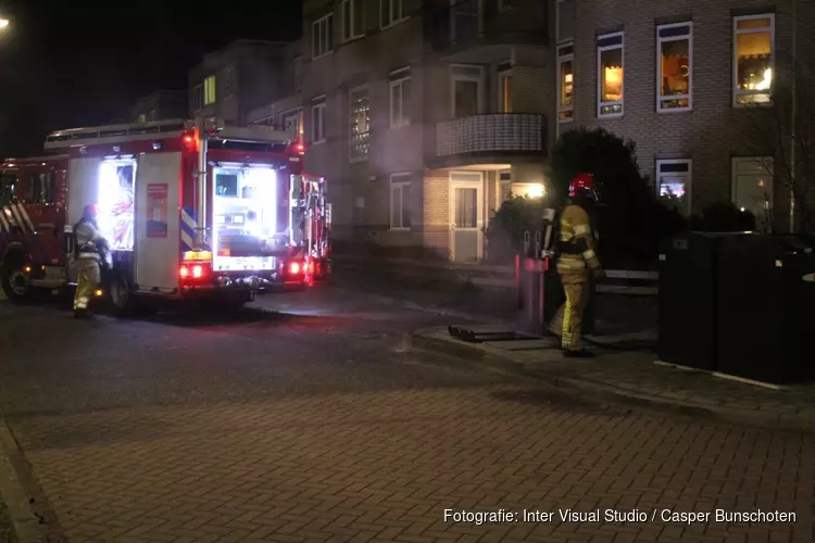 Brand in ondergrondse container in Huizen