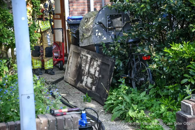 Brand door wasmachine in woning in Hilversum