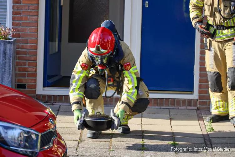 Brand in keuken van woning Huizen