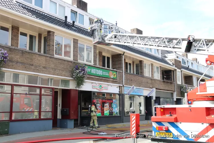 Brand in dak boven New York Pizza Bussum