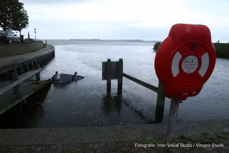 Auto te water in Huizen